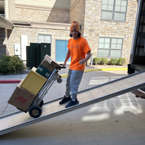 Movers, Hand Truck, Unloading, Moving Truck, and Moving Boxes from Moovin & Groovin uploaded 12:31 PM on Jul 1st, 2025