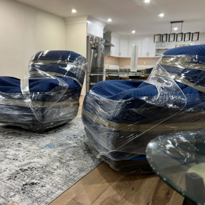 Furniture, Moving Blankets, Plastic Wrap, and Packing from RELOQ Moving Services uploaded 2:13 PM on Jan 9th, 2026