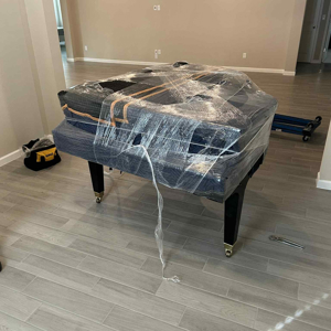 Piano, Plastic Wrap, and Moving Blankets from G&B Moving Services LLC uploaded 8:11 PM on May 5th, 2026