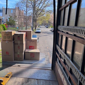 Movers, Moving Truck, Unloading, and Moving Boxes from Boss Moving Company LLC uploaded 7:03 PM on Apr 1st, 2026