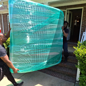 Furniture, Moving Truck, Plastic Wrap, Moving Blankets, and Stairs from Daniels Moving and Logistics uploaded 12:09 PM on Jul 3rd, 2025