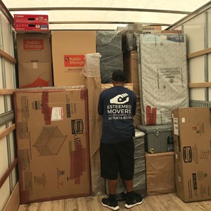 Loading, Furniture, Moving Boxes, Movers, Moving Blankets, Moving Truck, and Plastic Wrap from Esteemed Movers uploaded 12:33 AM on Dec 14th, 2019